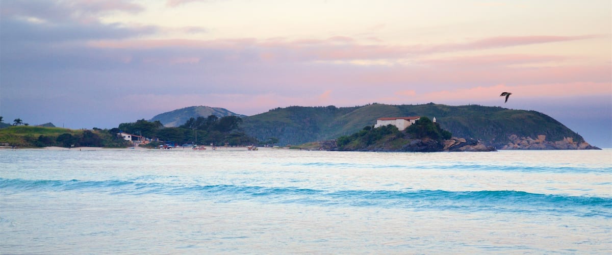 Sao Mateus Fort featuring general coastal views, a sandy beach and a sunset