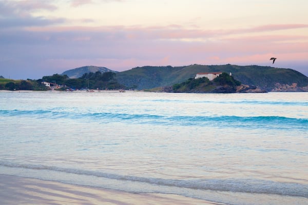 Sao Mateus Fort featuring general coastal views, a sunset and a sandy beach
