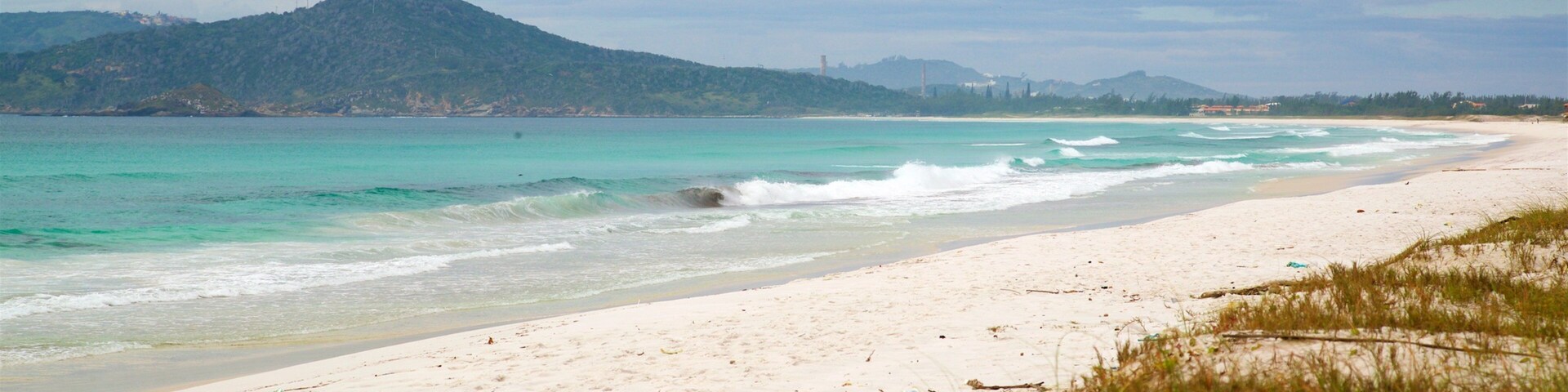 Foguete Beach which includes a sandy beach and general coastal views