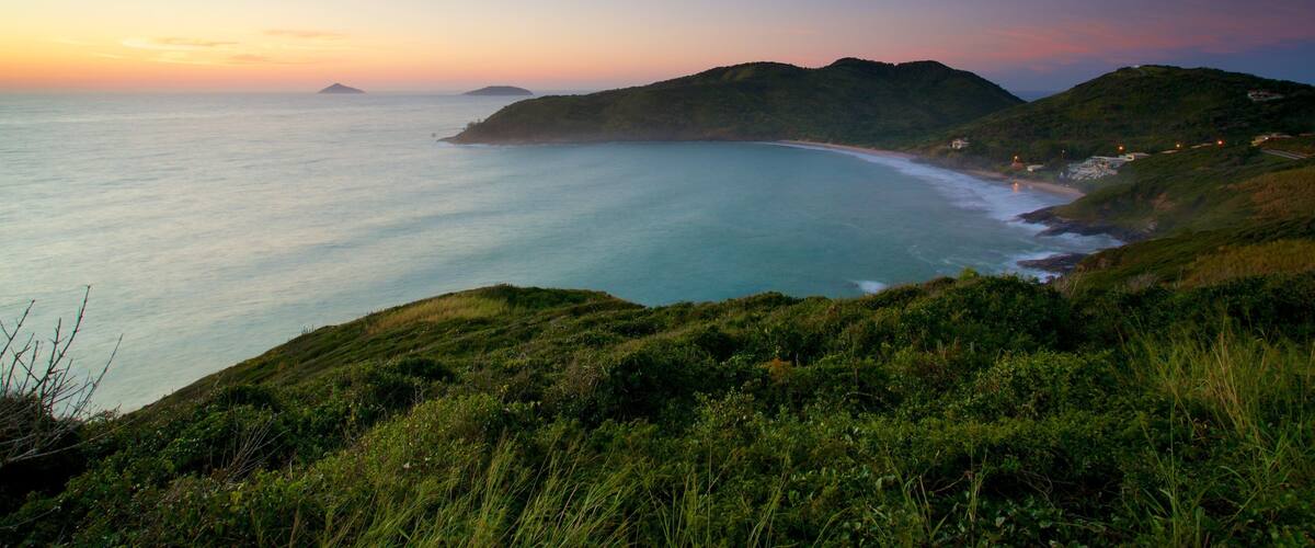 Joao Fernandes Viewpoint featuring a sunset, general coastal views and landscape views