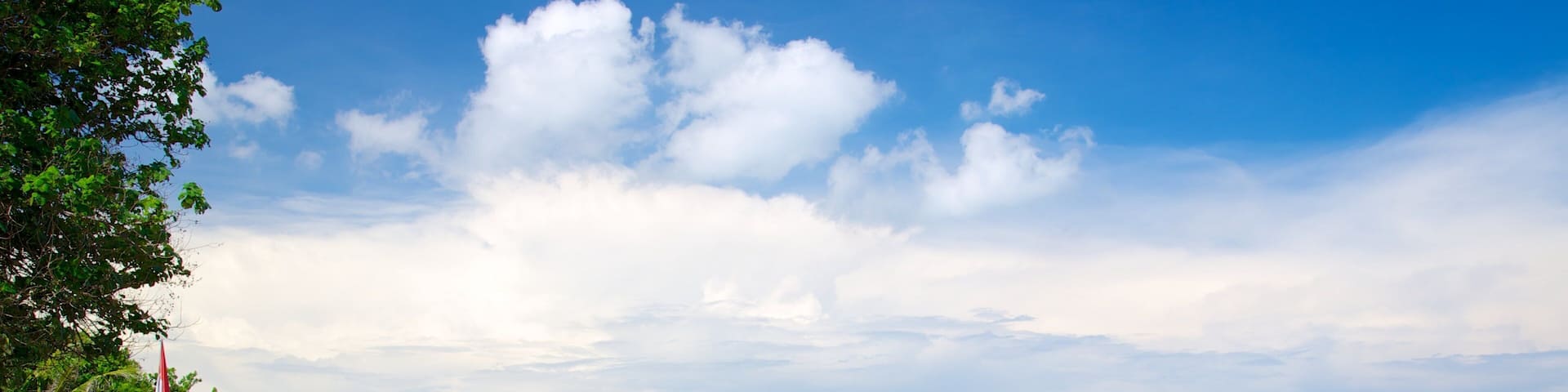 Double Six Beach showing tropical scenes and a beach