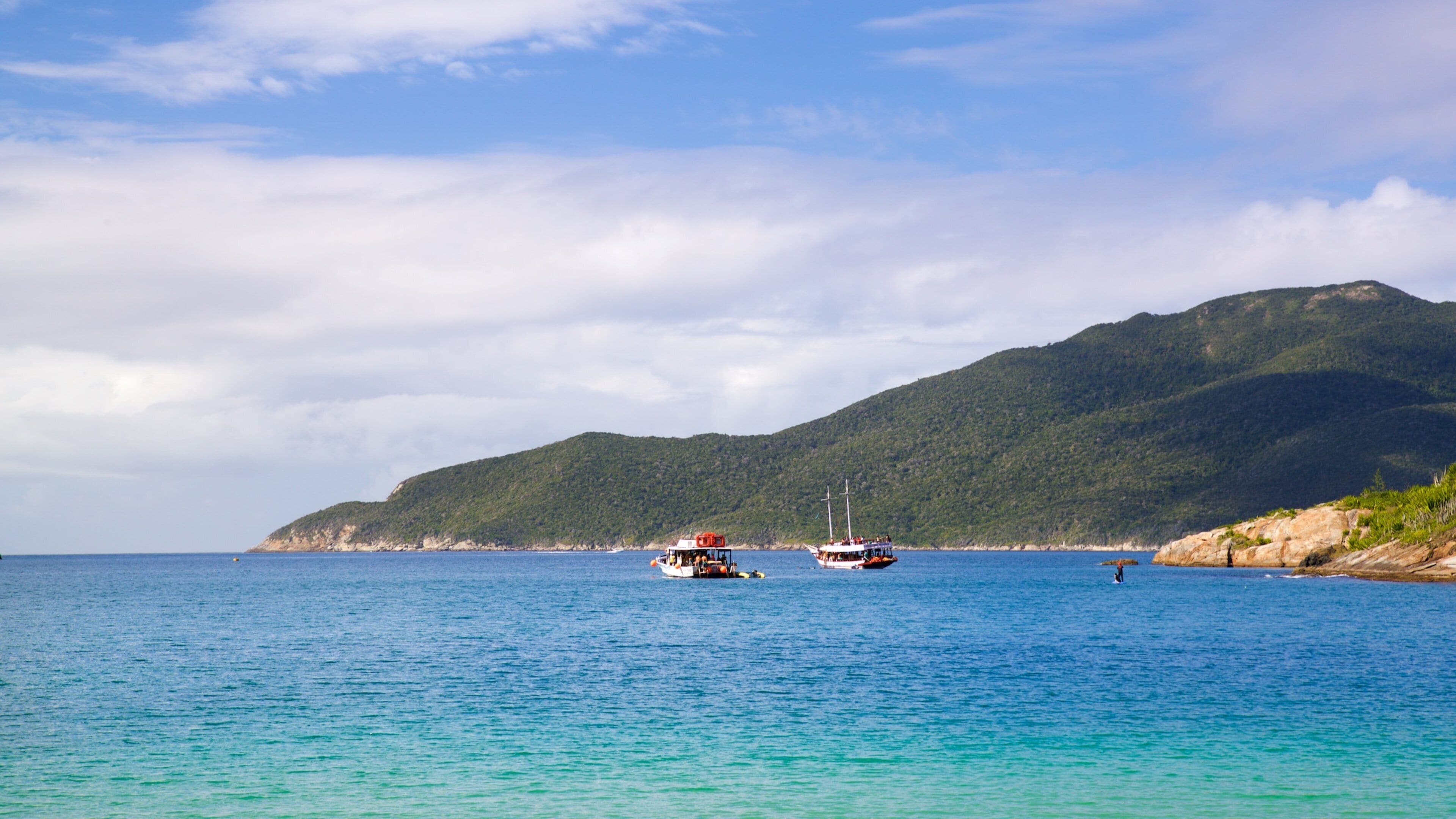 Forno Beach which includes boating and general coastal views