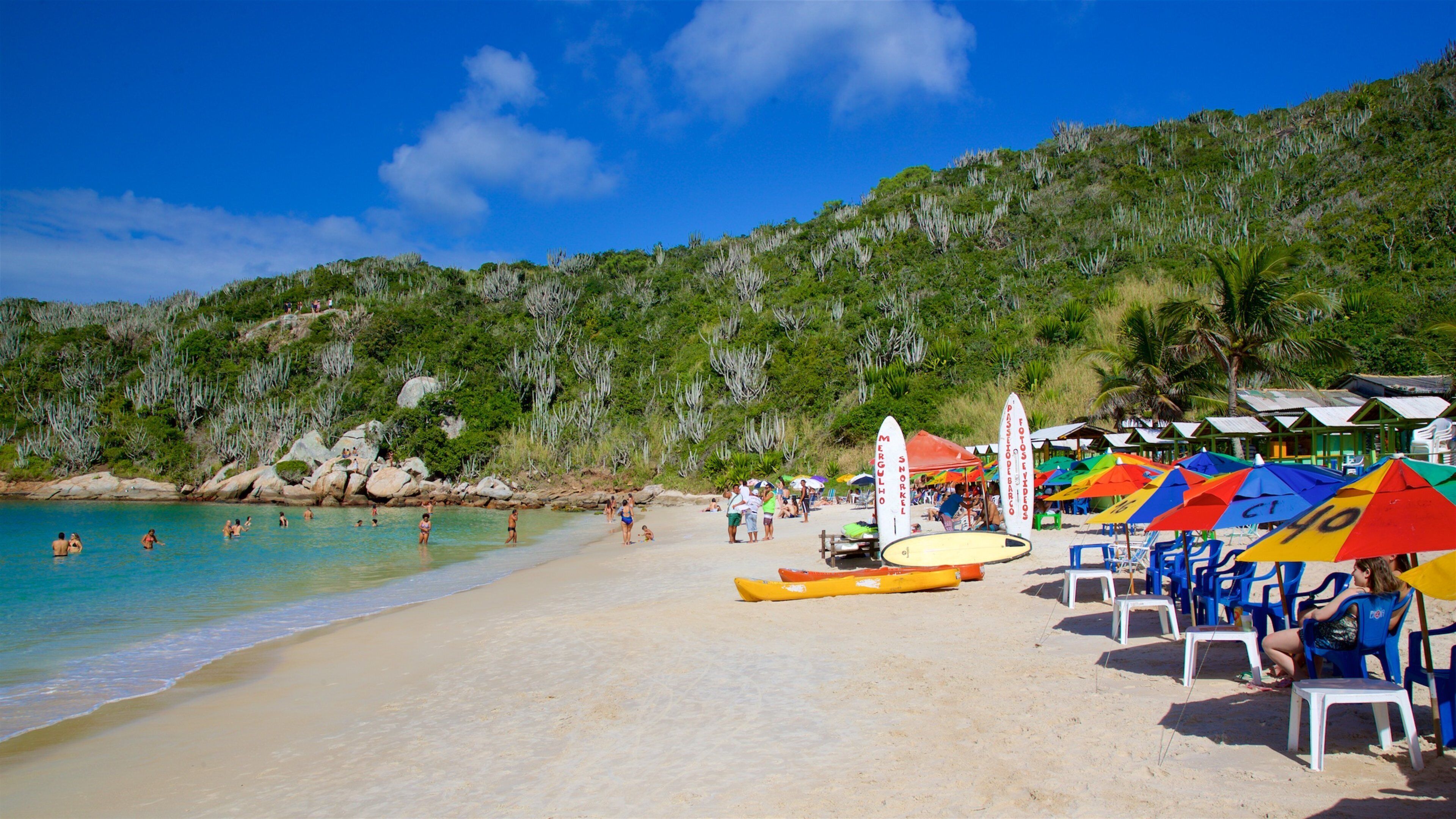 Forno Beach showing general coastal views, rocky coastline and a sandy beach