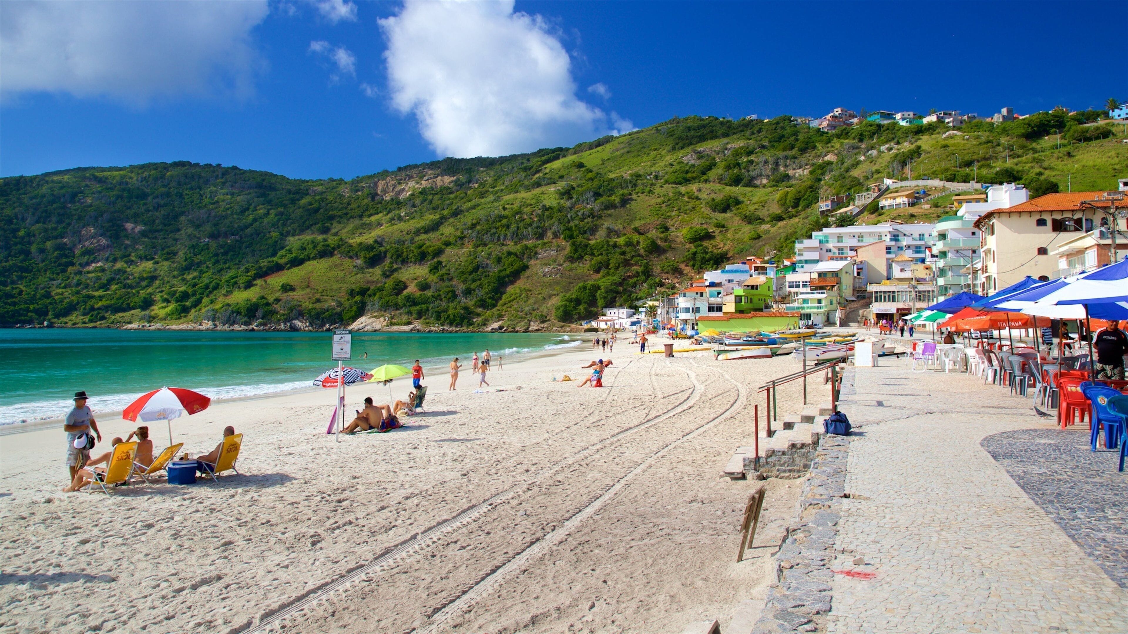 Prainha Beach which includes general coastal views, a coastal town and a beach