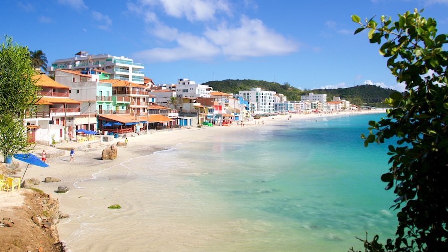 Prainha Beach showing a beach, a coastal town and general coastal views