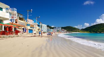 Prainha Beach showing general coastal views, a sandy beach and a coastal town