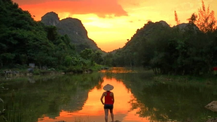 1.5hrs south of Hanoi is the beautiful Tam Coc, Ninh Binh.
It is beautiful, peaceful and serene with loads of Mountains, Boat trips and Temples. If you are planning a trip to Vietnam spend more days here instead of crazy Hanoi