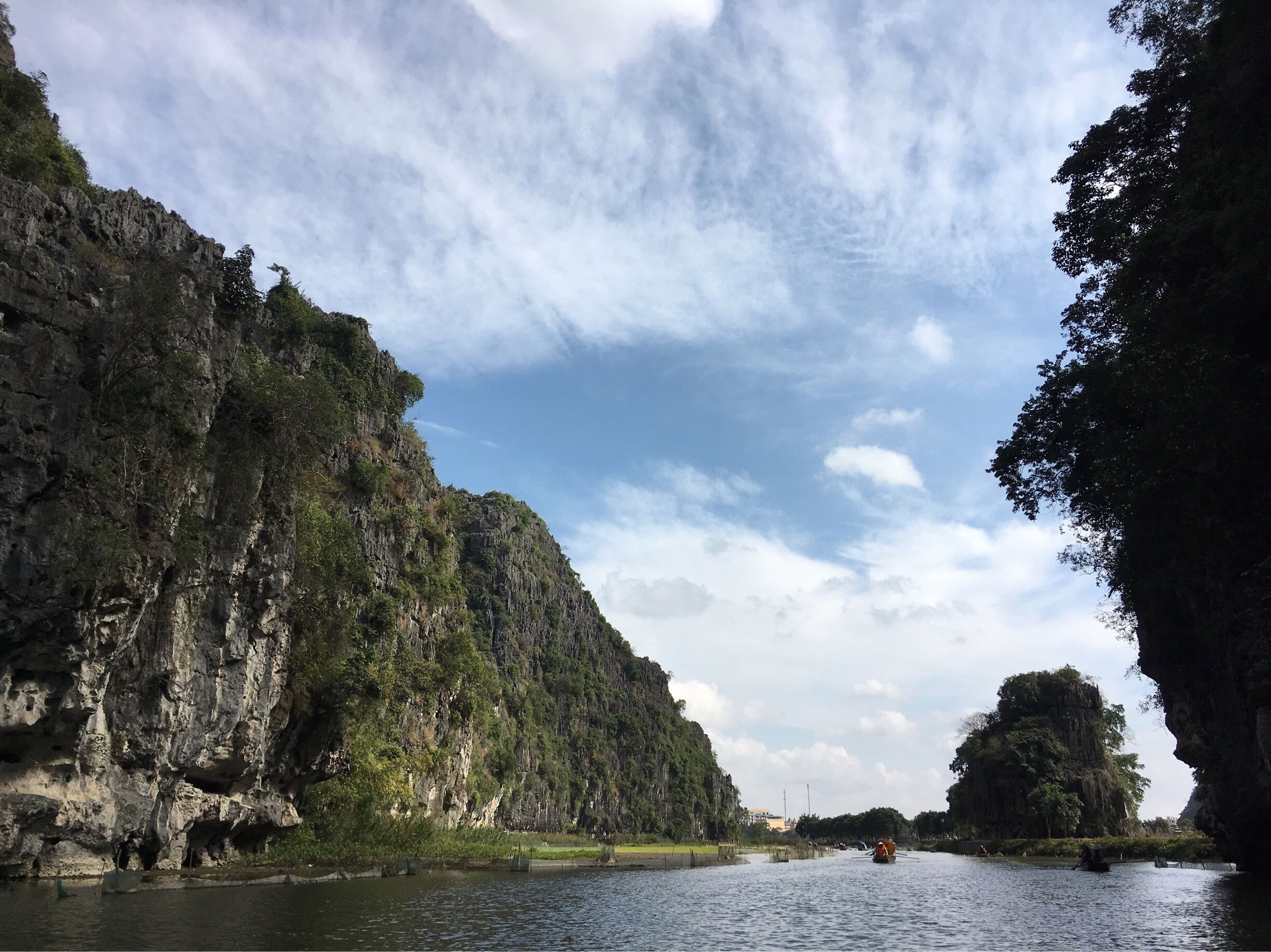 Tam Coc, known as Halong Bay on island. Enjoy the natural from the traditional paddle boat which people use their legs to paddle 