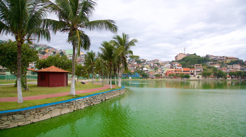 Hermes Barcellos Public Park featuring a coastal town and a lake or waterhole