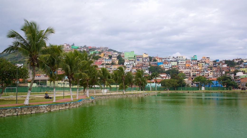 Hermes Barcellos Public Park featuring a coastal town and a lake or waterhole