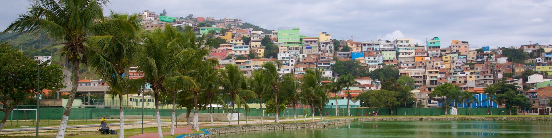 Hermes Barcellos Public Park featuring a coastal town and a lake or waterhole