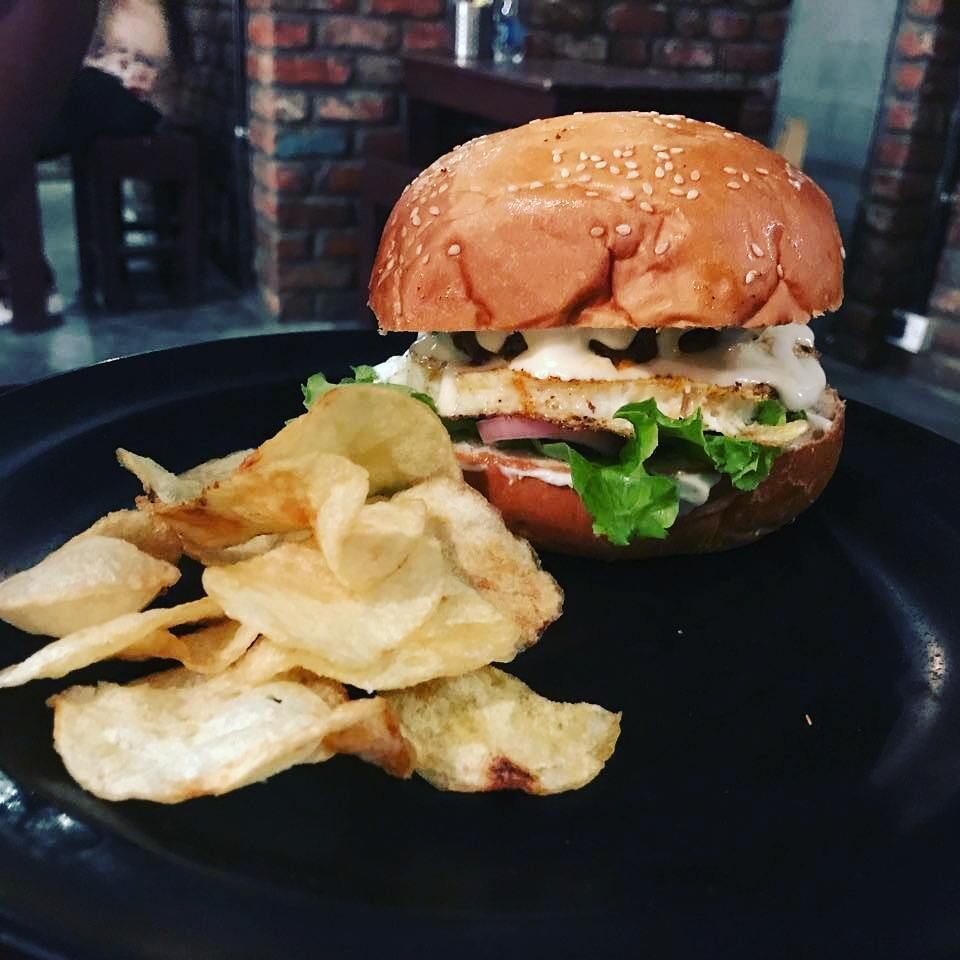 Cheap eats, great food, quirky ambience, great for dining. Serves beef but no pork, no beer. Present in koramangala too. Avoid the pizza, try the baked cheesecake.