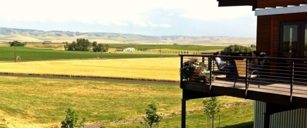 Beautiful and unpretentious, this winery recently moved their tasting room out of town and into a novel ski-lodge like structure atop one of the foothills south of town. The view is stunning, and the wines are fun and accessible. The same winemaker also works the upmarket Pepper Bridge wines, and Amavi is his outlet to experiment with different grapes, blends and vineyards. In addition to tastings, they'll also pour glasses - in case you just want to hang out on the deck and enjoy the view.  Best enjoyed in the afternoon when the deck is shaded.