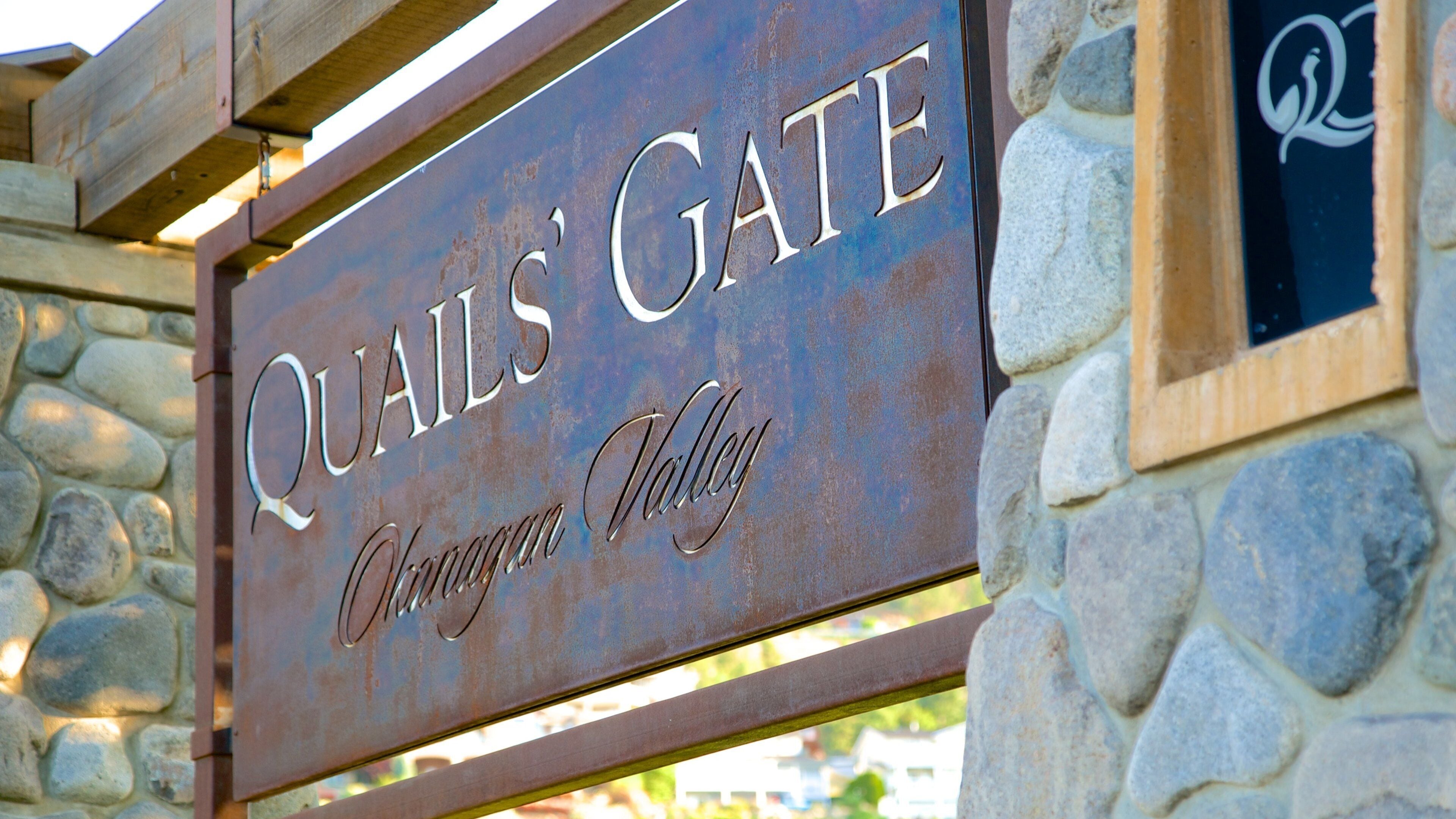 A sign reading "QUAILS' GATE" with "Chinatown Valley" below it.
