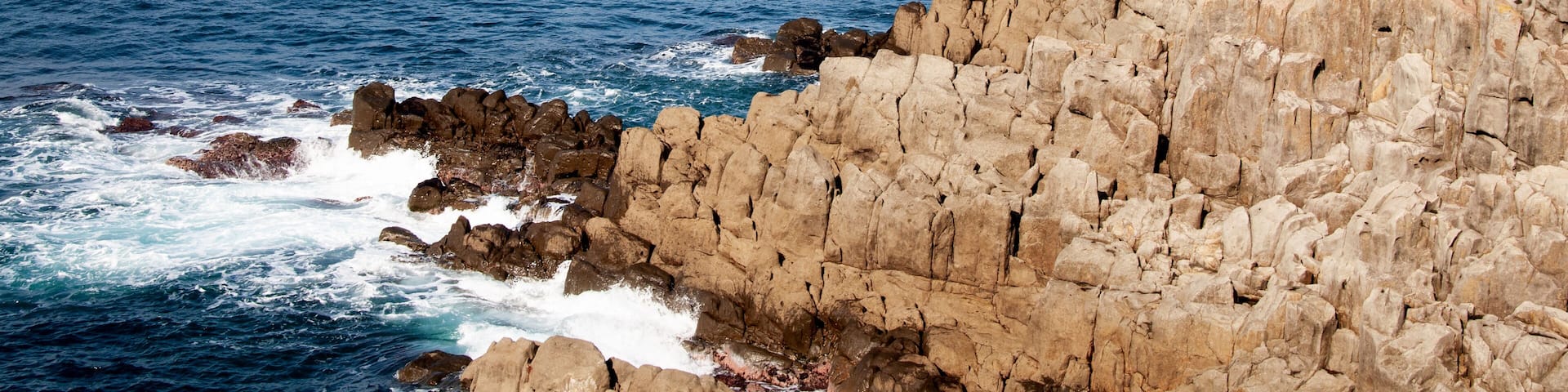 Tojinbo cliffs with blue sky on sunny day. Fukui, Japan