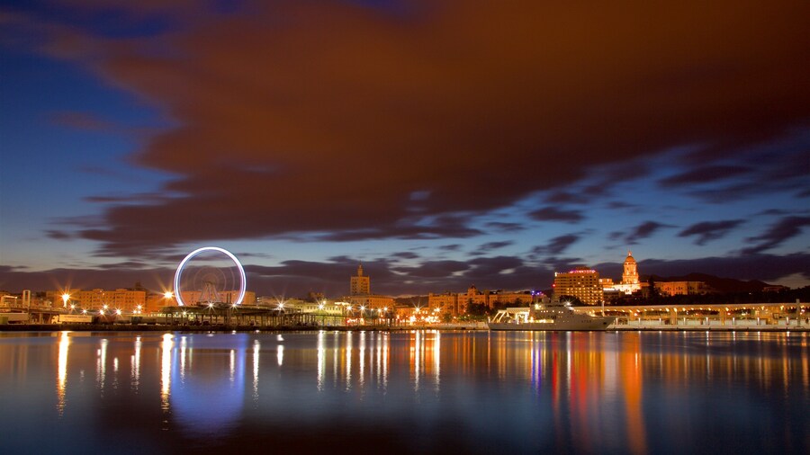 Port of Malaga which includes a city, general coastal views and night scenes