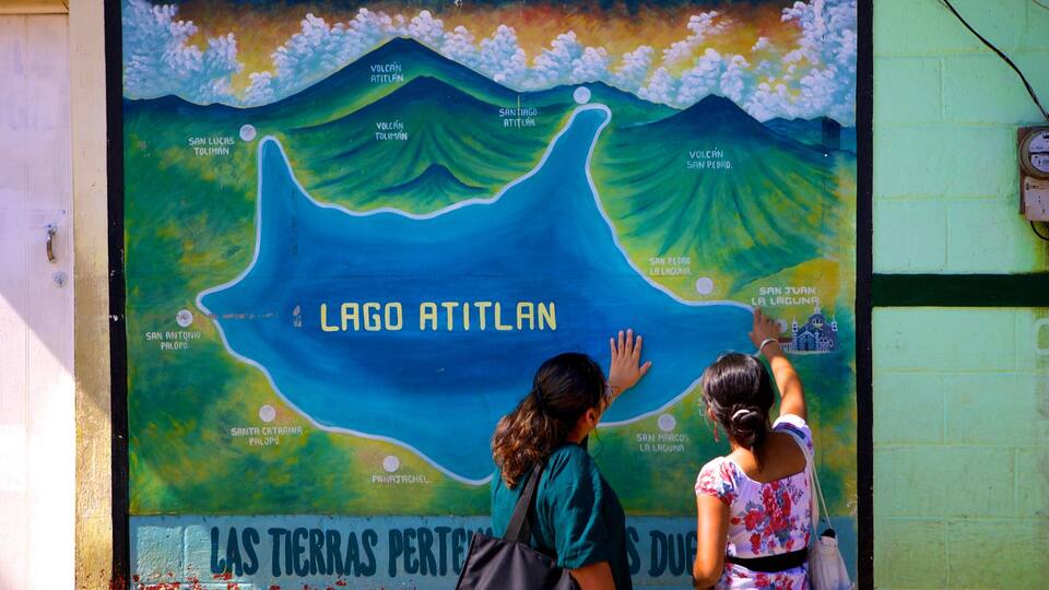 A mural of Lago Atitlan with surrounding landmarks.