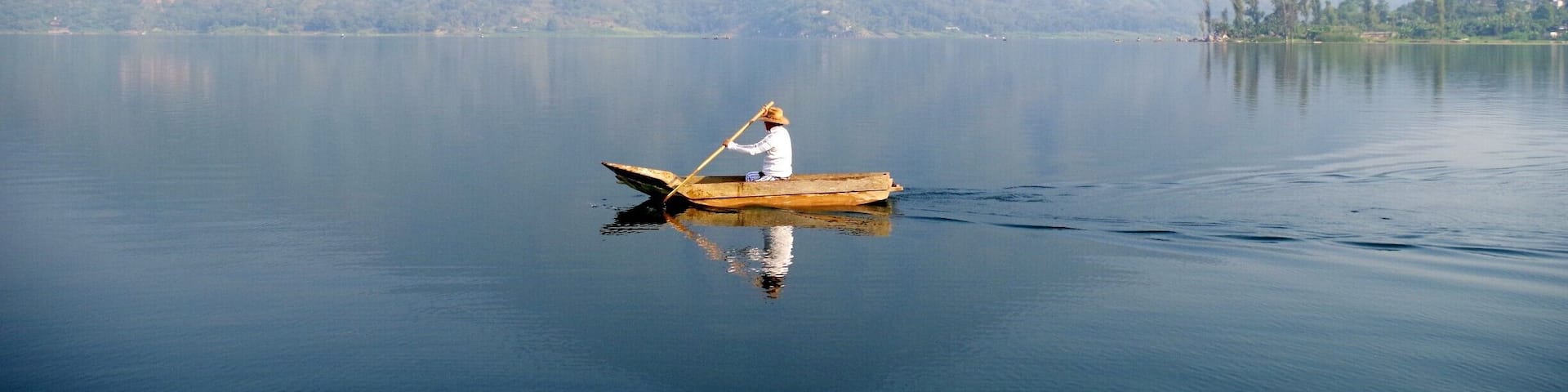 These dugout canoes are called Cayucos. They looked so sturdy and peaceful slowly paddling along the shores of Lake Atitlan. They are used for fishing. Volcan San Pedro is in the background.