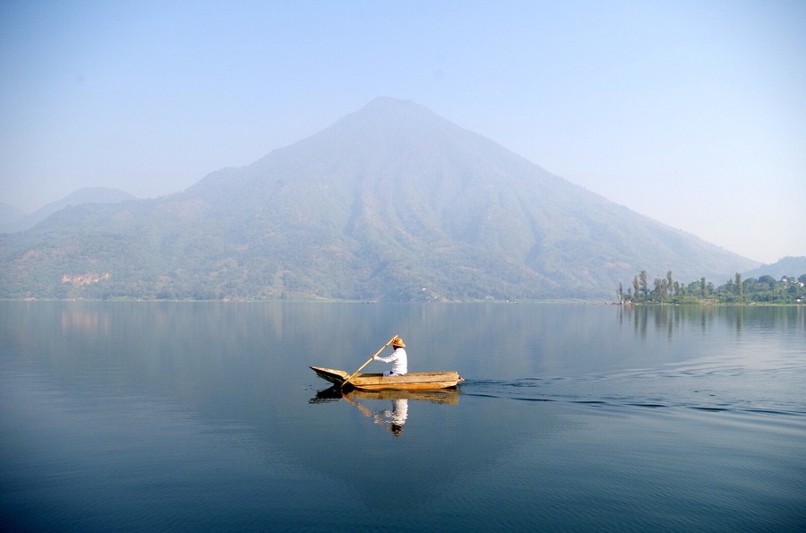 These dugout canoes are called Cayucos. They looked so sturdy and peaceful slowly paddling along the shores of Lake Atitlan. They are used for fishing. Volcan San Pedro is in the background.