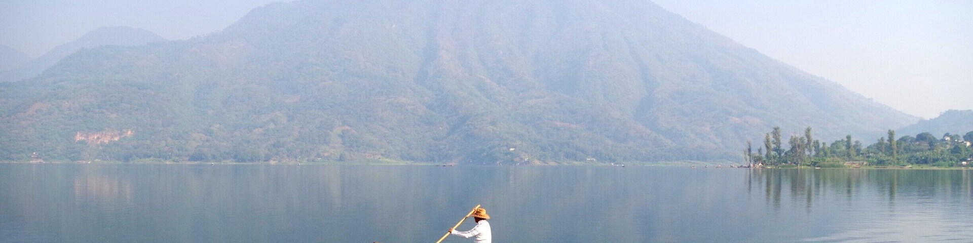 These dugout canoes are called Cayucos. They looked so sturdy and peaceful slowly paddling along the shores of Lake Atitlan. They are used for fishing. Volcan San Pedro is in the background.