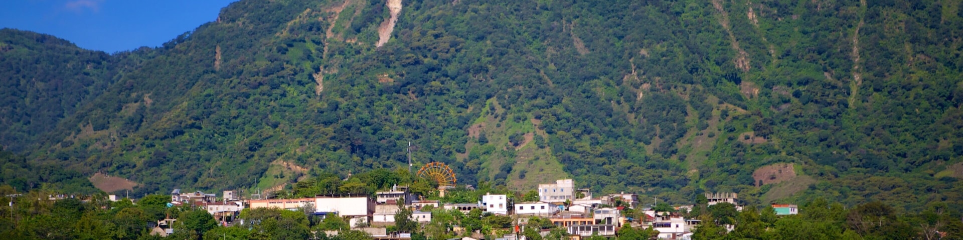 San Juan La Laguna featuring a lake or waterhole and mountains