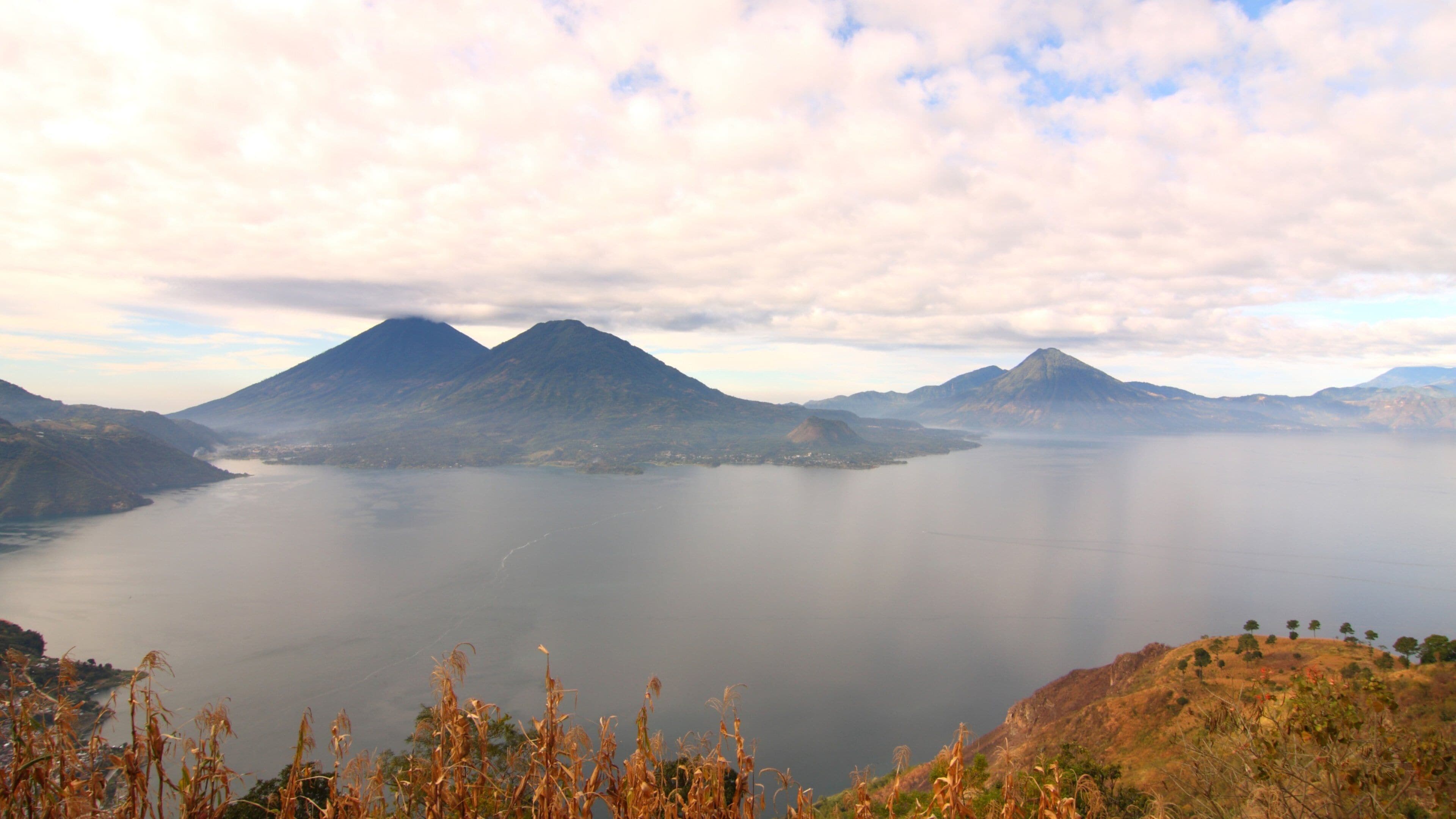 Lake Atitlan featuring landscape views, a lake or waterhole and mountains