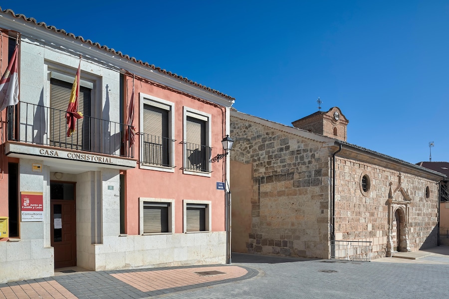 Stone parish church Santa Maria la Mayor del Castillo from the 16th century in Valbuena de Duero, Valladolid, Spain