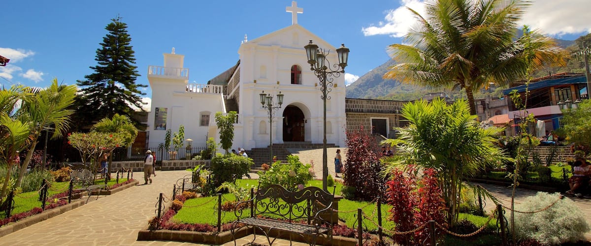 Church of Saint Peter featuring a church or cathedral and a garden