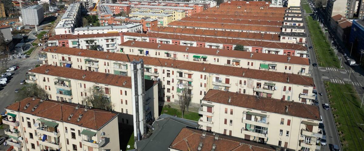 Italy, Milan 03-14-2024 Aler public housing blocks to be demolished in the suburban neighborhood of Giambellino Lorenteggio - Drone view of occupied poor homes - urban redevelopment of the suburbs