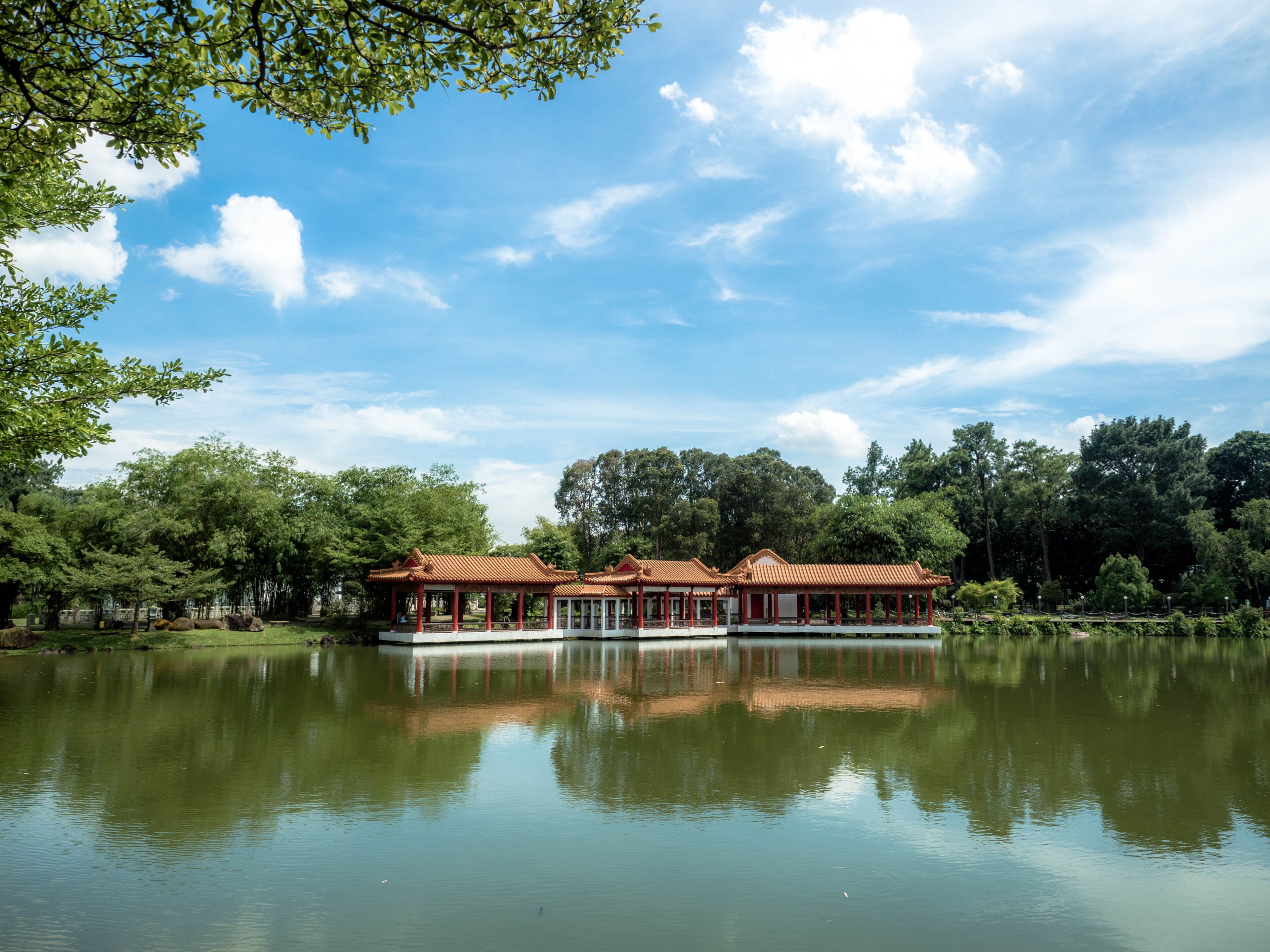 Singapore Nov 26, 2018: Traditional Chinese pavilions on the lake at The Chinese Gardens (Lake, bridge, and Twin Pagoda), Singapore.