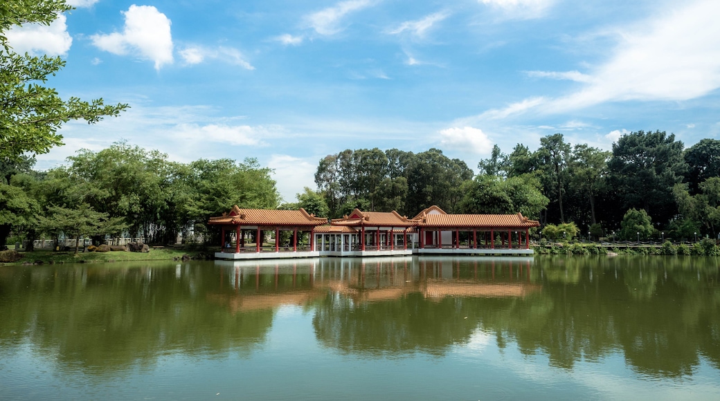 Singapore Nov 26, 2018: Traditional Chinese pavilions on the lake at The Chinese Gardens (Lake, bridge, and Twin Pagoda), Singapore.
