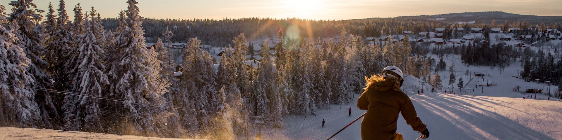 Branas Ski Resort which includes a sunset, snow skiing and snow