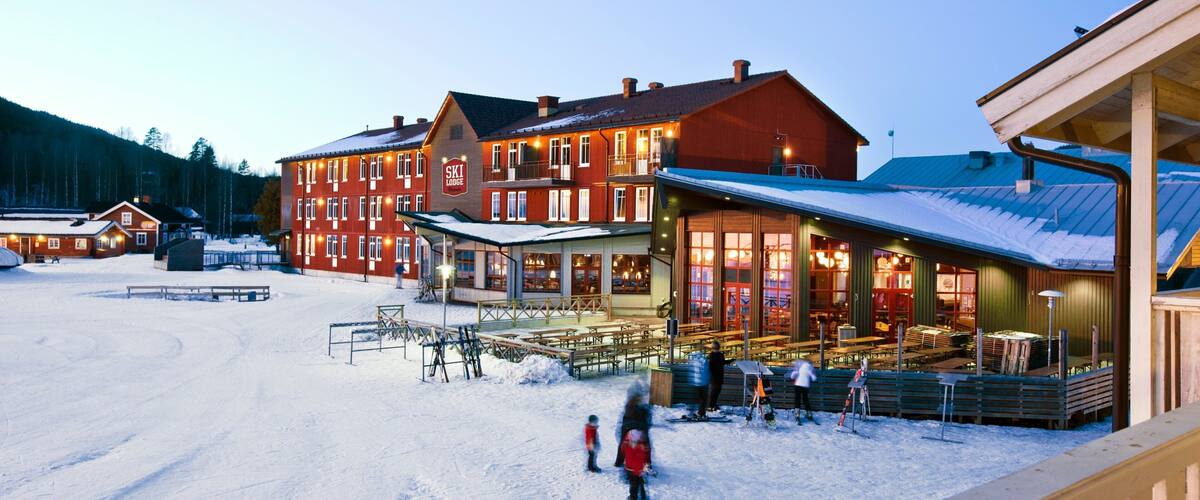 Branas Ski Resort which includes a small town or village, street scenes and snow