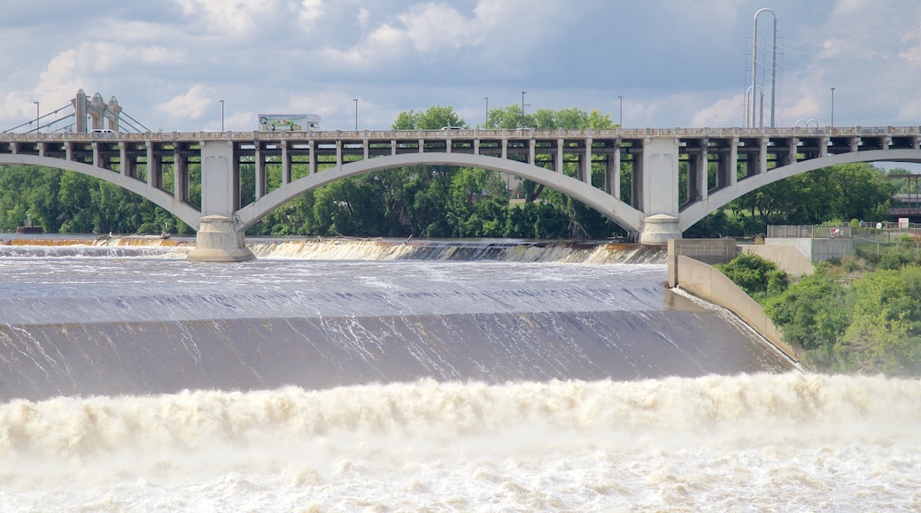 Saint Anthony Falls showing a bridge and a river or creek