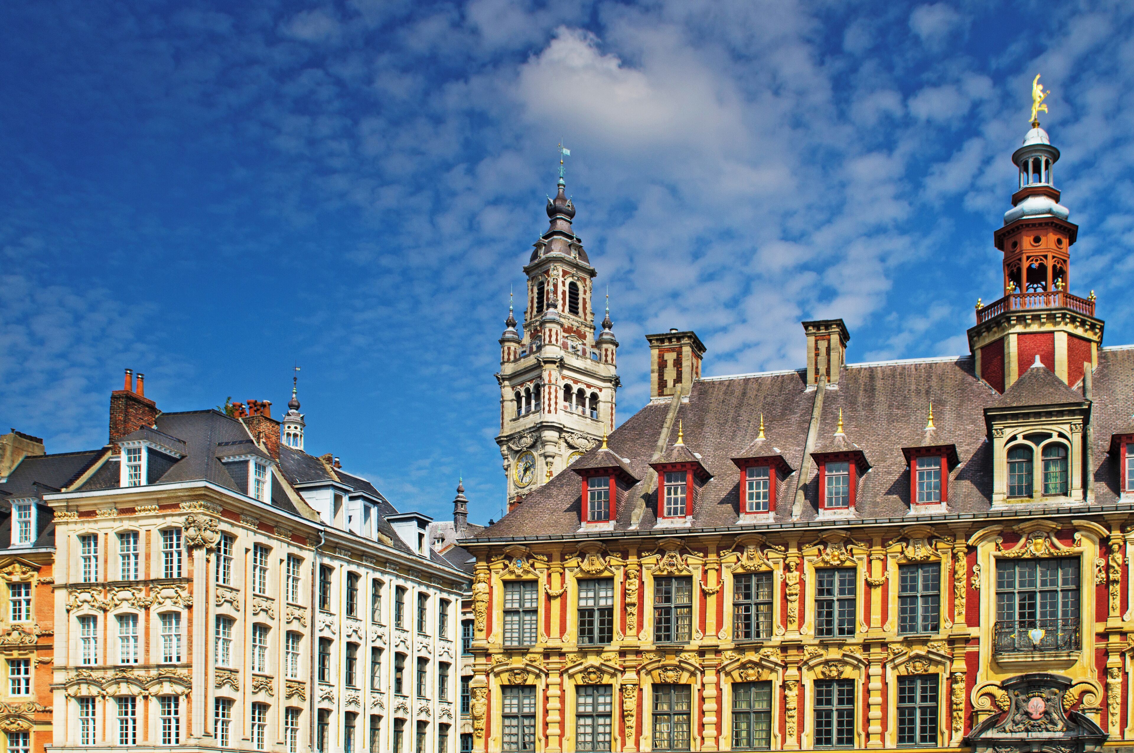 Lille Grand Place showing the Chamber of Commerce tower in the centre and  Vieille Borse on the right.