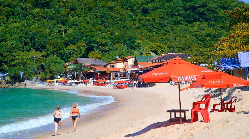 Ranch Beach which includes a coastal town, a sandy beach and tropical scenes