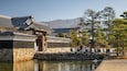 Matsumoto Castle showing a pond and heritage elements
