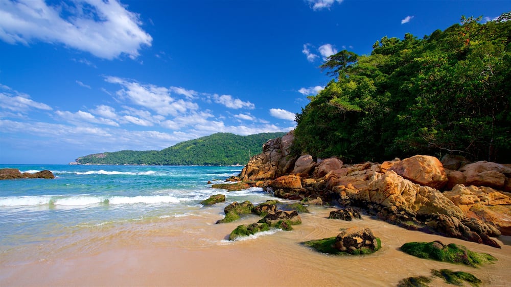 Meio Beach which includes general coastal views, rugged coastline and a beach