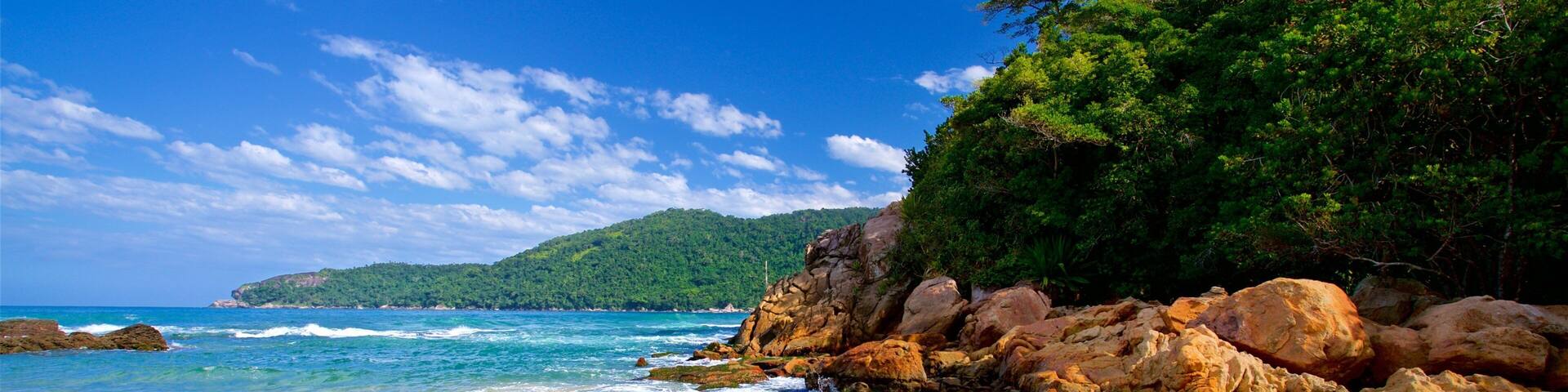 Meio Beach which includes general coastal views, rugged coastline and a beach