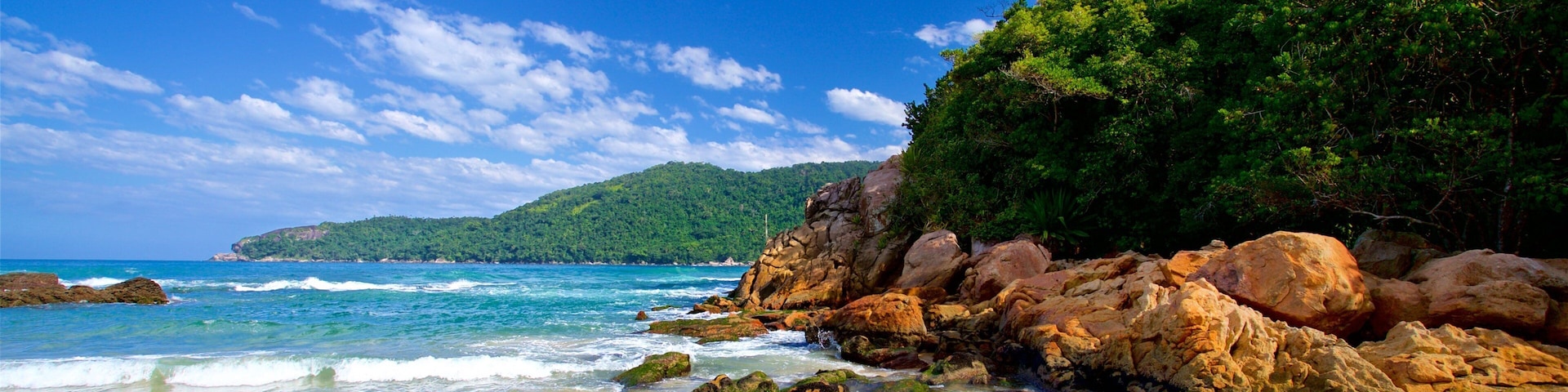 Meio Beach which includes general coastal views, rugged coastline and a beach