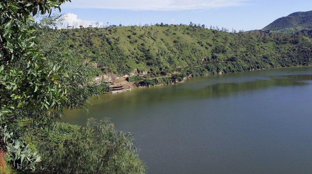 Panoramic view encompassing the forested and hilly shores of Lake Bishoftu, a crater lake in central Ethiopia south of Addis Ababa