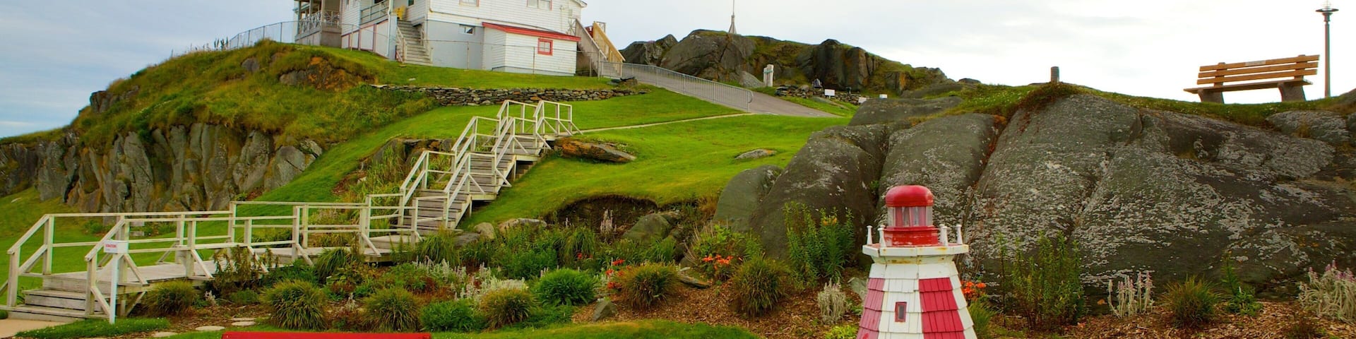 Cape Forchu Lightstation featuring a garden and a lighthouse