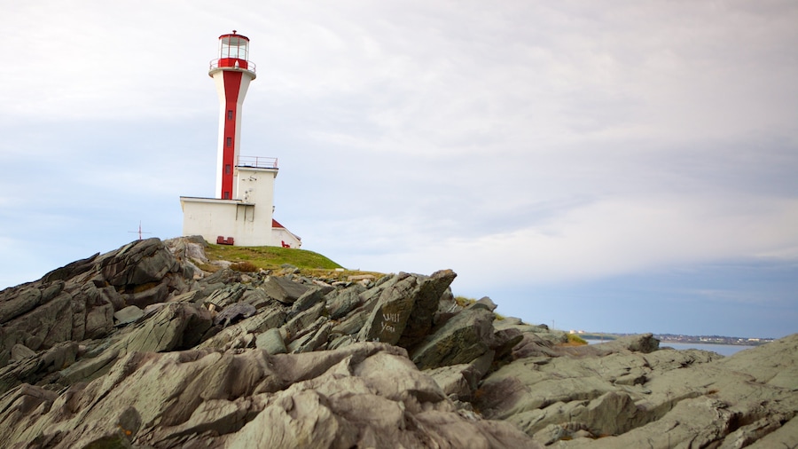 Cape Forchu Lightstation featuring a lighthouse and rugged coastline