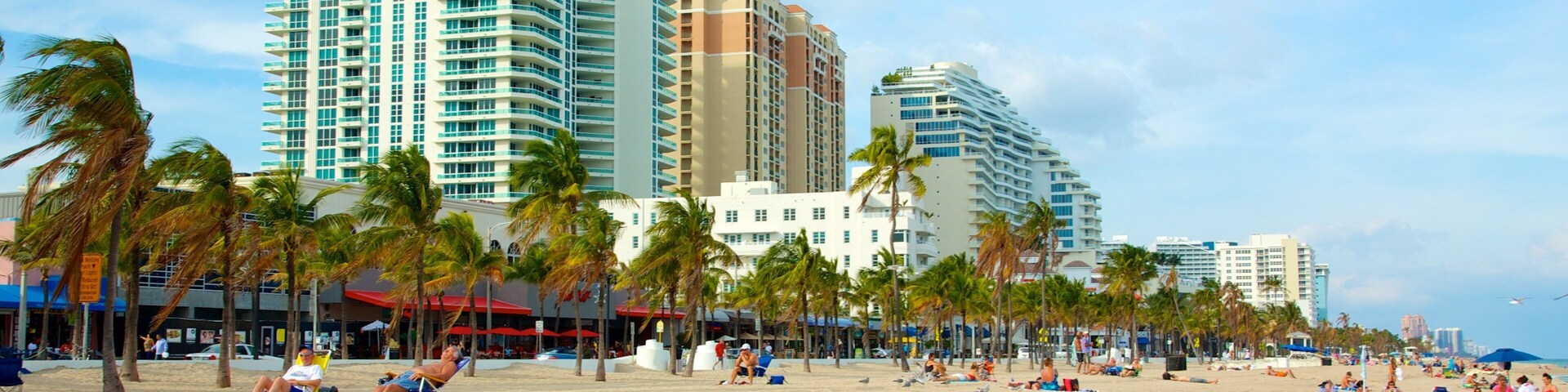 Fort Lauderdale Beach showing a sandy beach and a luxury hotel or resort