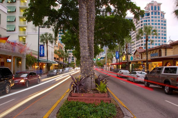Streets of Las Olas Boulevard vibrate with energy and life during evening hours in Fort Lauderdale, Florida