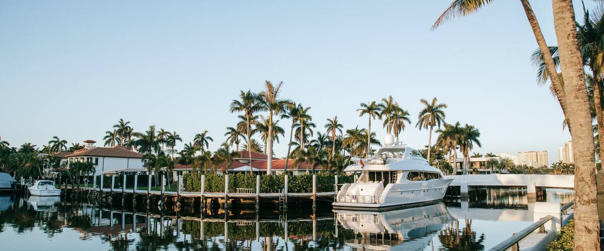 Las Olas Boulevard featuring a bay or harbor and a river or creek