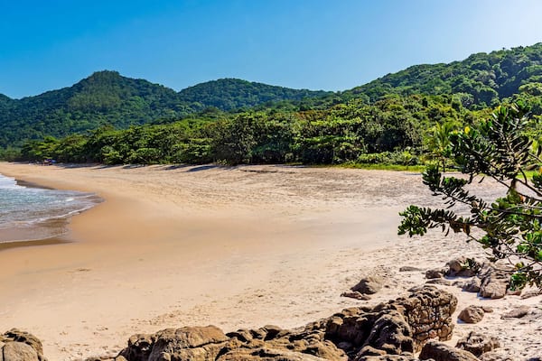 Panoramic image of Praia Branca (White Beach) located in the city of Bertioga and surrounded by rainforest on the coast of Sao Paulo, Brazil