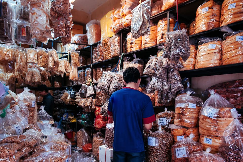 A market with various packaged goods on shelves.