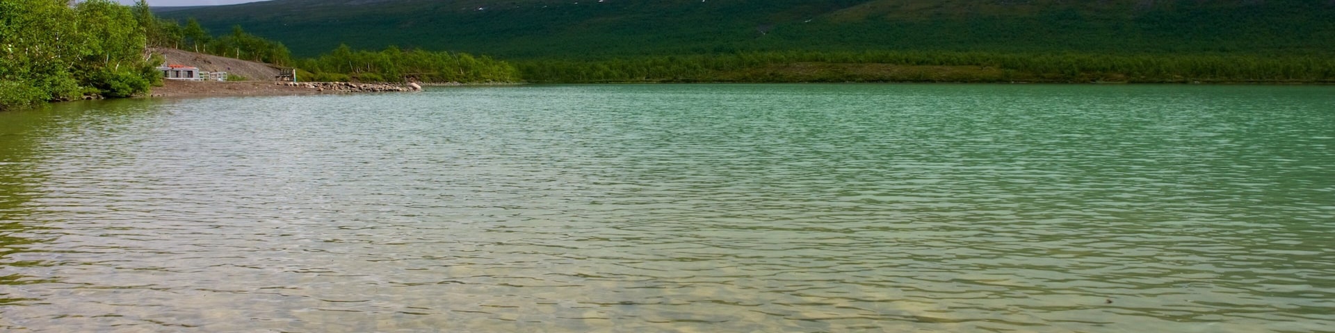 Kebnekaise which includes a lake or waterhole and mountains