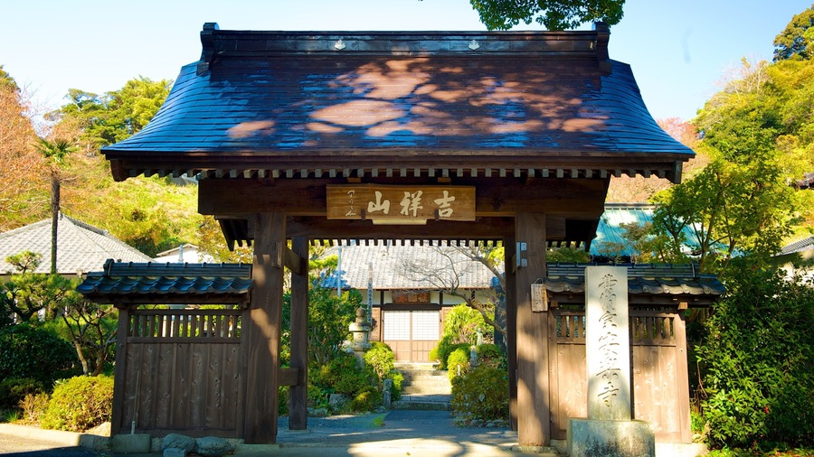 Anrakuji Temple which includes religious elements, a garden and signage